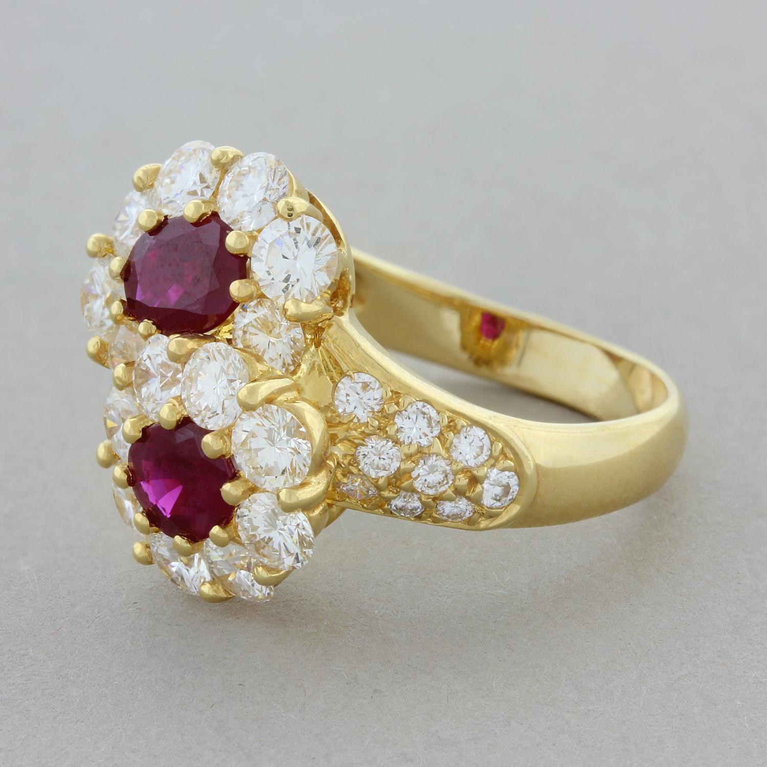 This elegant ring features two side-by-side flower clusters. The 1.24 carats of oval cut rubies are haloed by 2.01 carats of VS quality round cut set in 18K yellow gold. A simple yet quality piece with lovely bright gems and diamonds.

Ring Size 6.5