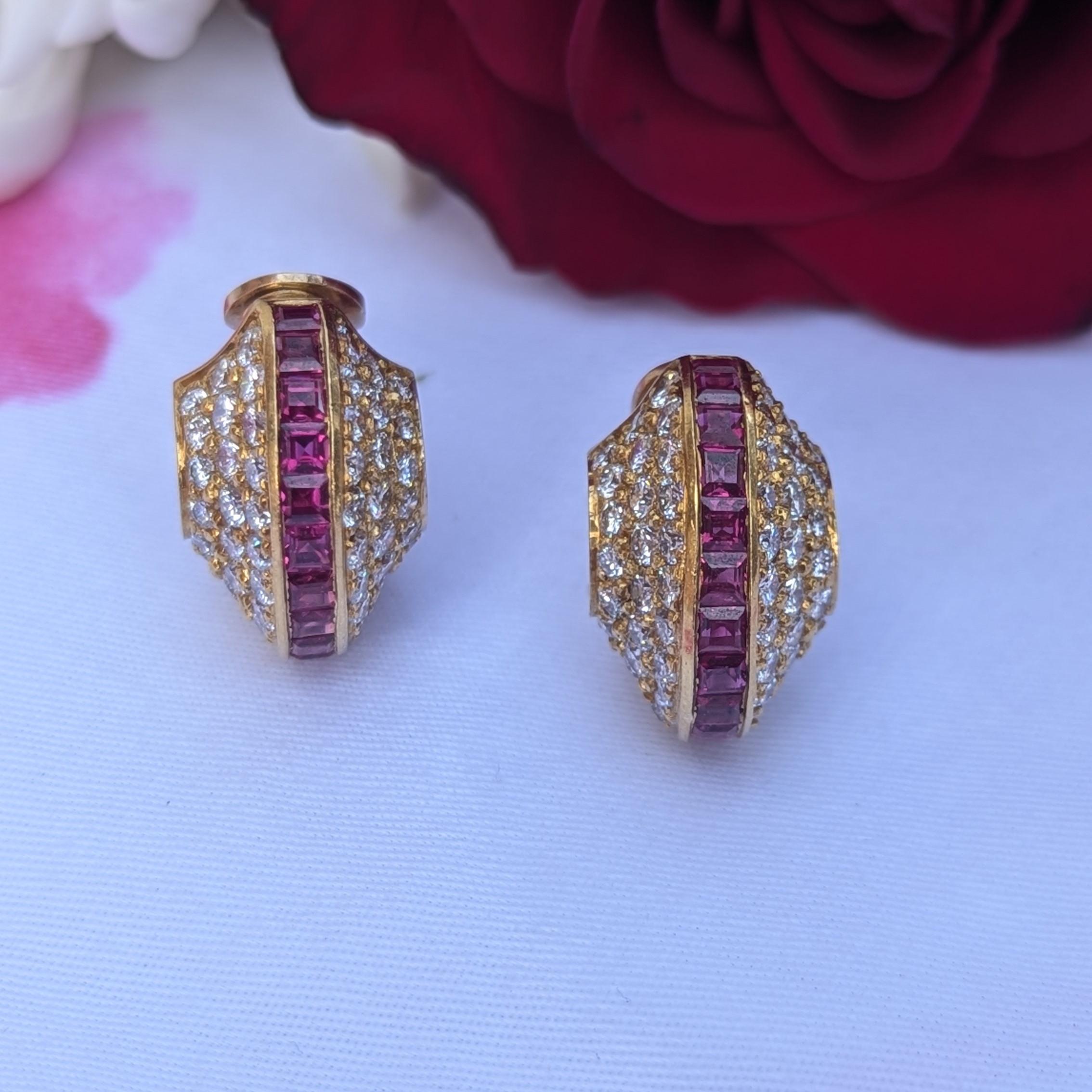 Beautiful, square-cut, invisible-set rubies encased with pave diamonds differentiate these half-hoop earrings from the rest. The estimated total ruby weight is 1.10 carats and the estimated total diamond weight is 2.50 carats, all mounted in 18K