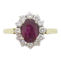 Ruby & Diamond Halo Ring Crafted in 18k Yellow Gold