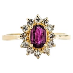Ruby & Diamond Halo Ring in 14k Yellow Gold