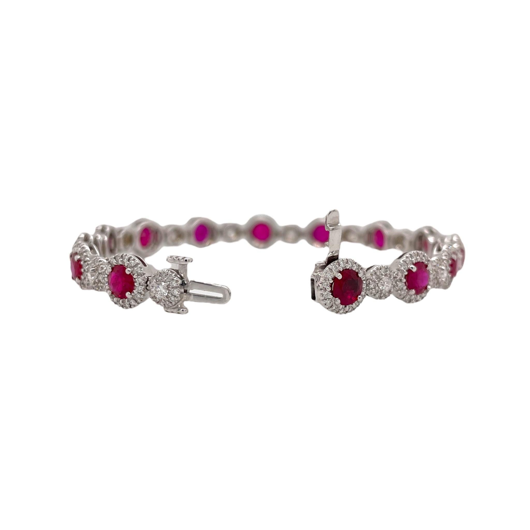 Elegant ruby and diamond bracelet contains 14 round brilliant rubies weighing a total of 6.75ct. Rubies are accented by diamond halos and min diamond clusters totaling 2.25cts. Diamonds are near colorless and VS2 in clarity. All stones are mounted