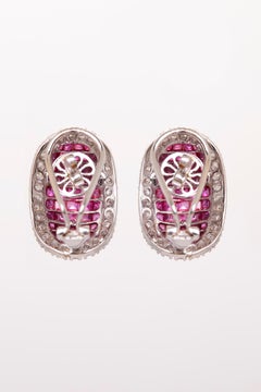 Abbracci con rubini e diamanti in oro 14 carati