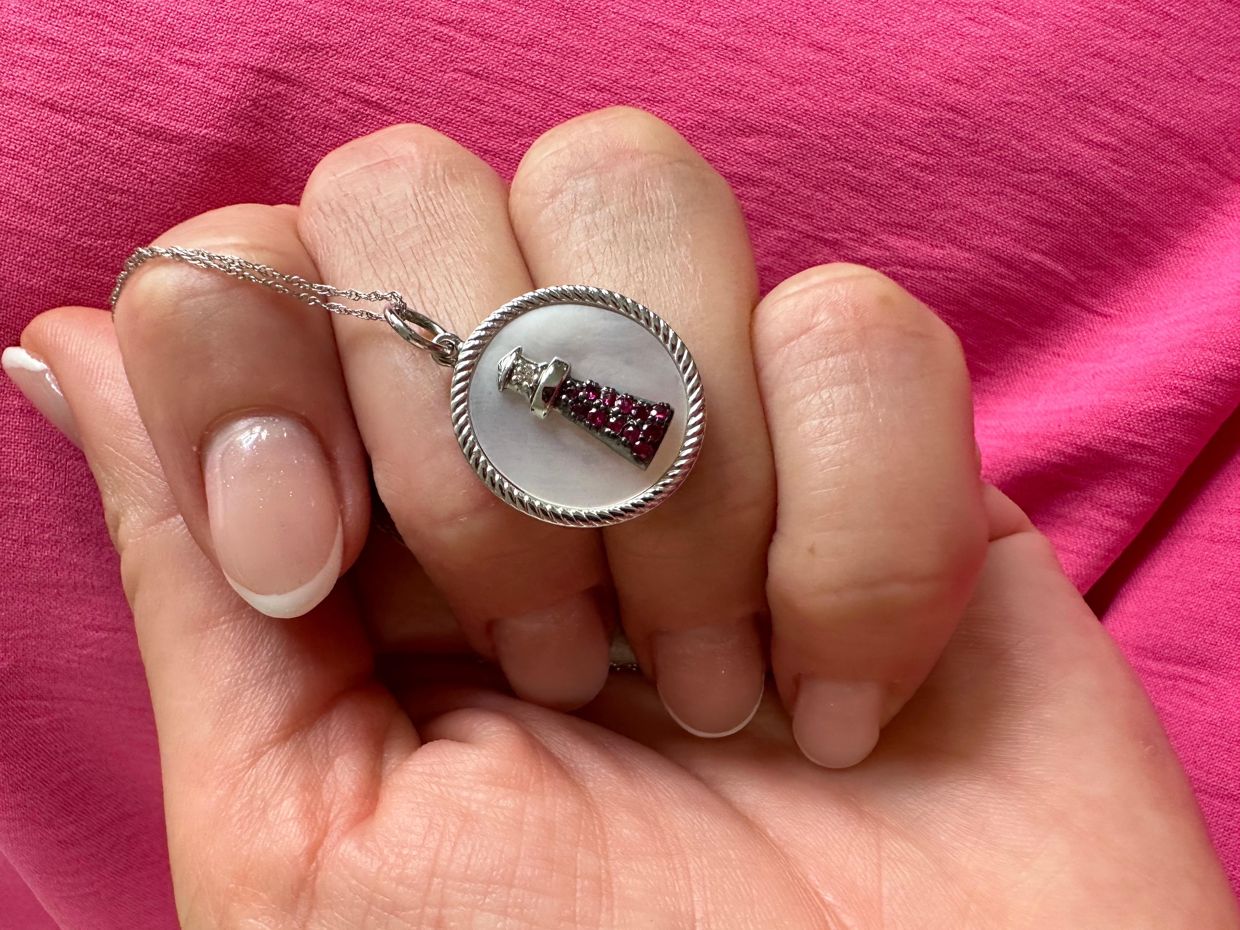 Stunning Lighthouse made with mother of pearl, diamonds and rubies!

METAL: 14KT
NATURAL DIAMOND(S)
Clarity/Color: VS/F-G
Cut: Round Brilliant
NATURAL RUBY(S)
Clarity/Color: VS/F-G
Cut: Round
Grams:7 (chain included)


WHAT YOU GET AT STAMPAR