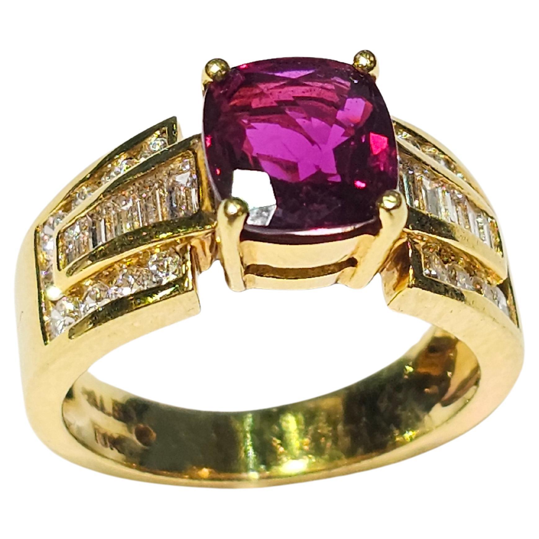 Ruby & Diamond Men's Ring

An 18 karat yellow gold ring set with a cushion cut ruby, 10 baguette cut diamonds, and 18 round cut diamonds

Accompanied by an AGL report stating that the ruby is of Thai origin and is heated

Ruby Approximate Weight: