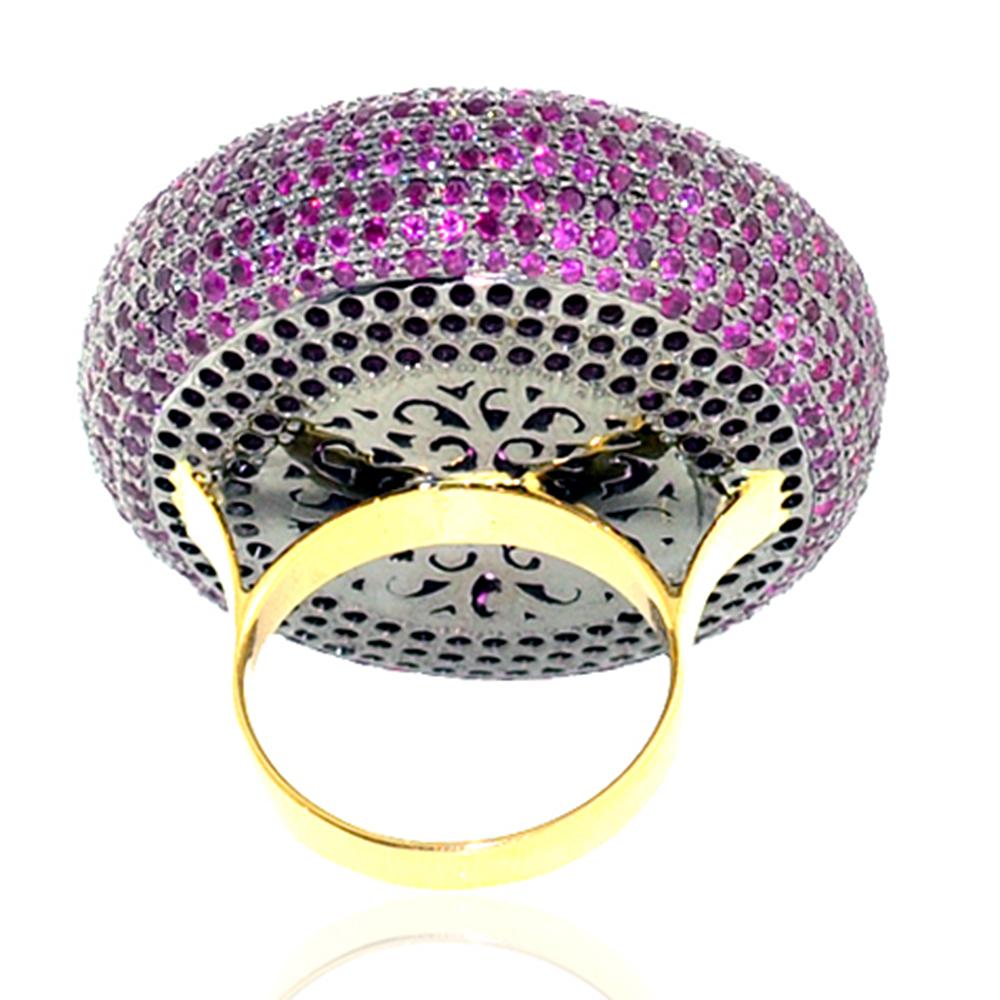 This pave ruby and diamond is truly a statement ring with the disc design with rosecut diamond in center. Shank of this ring is in 14K yellow gold

Ring Size: 7 ( can be resized )

14Kt: 2.9,
D:0.75
Ruby: 8.50cts