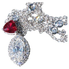 Sang de pigeon  Pendentif en rubis et diamants avec chaîne rouge rare du Mosambique 0,64 carat 