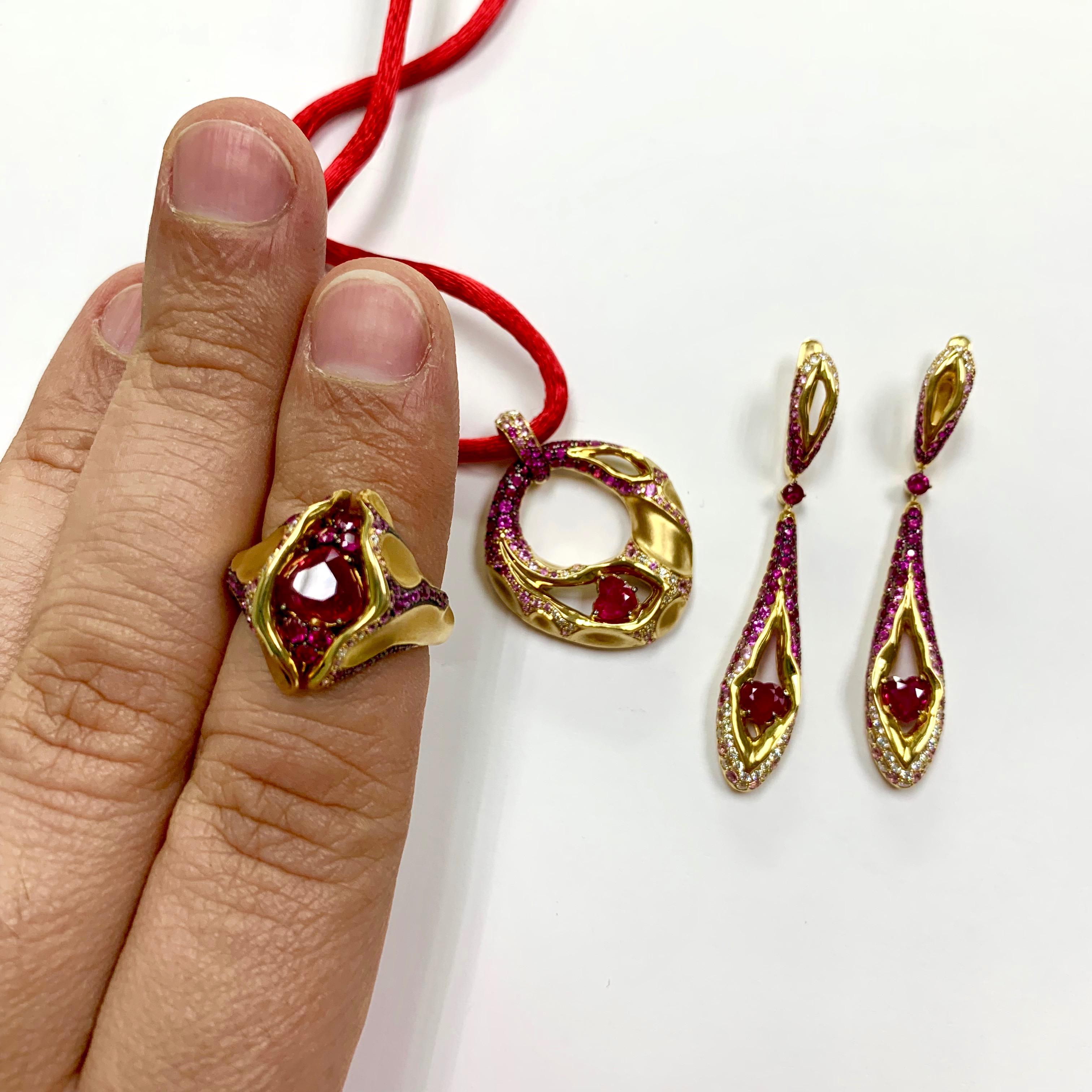 Ruby Diamond Pink Sapphire 18 Karat Yellow Gold HeartBeat Suite
Suite from the HeartBeat Collection. Сomposition resembles an exploded volcano, from the mouth of which lava flows from all sides. Center of the Yellow 18K Gold 