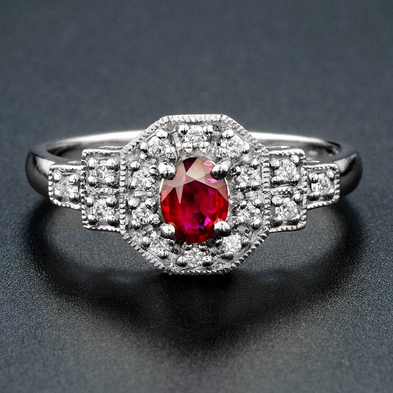 This vintage style ring was made in Platinum 950, the highest precious in metal.

The ring consists of...
Center Ruby 0.34 ct.
Total Diamond 16 pcs. 0.16 ct.

The ring was made in size US#7 1/4