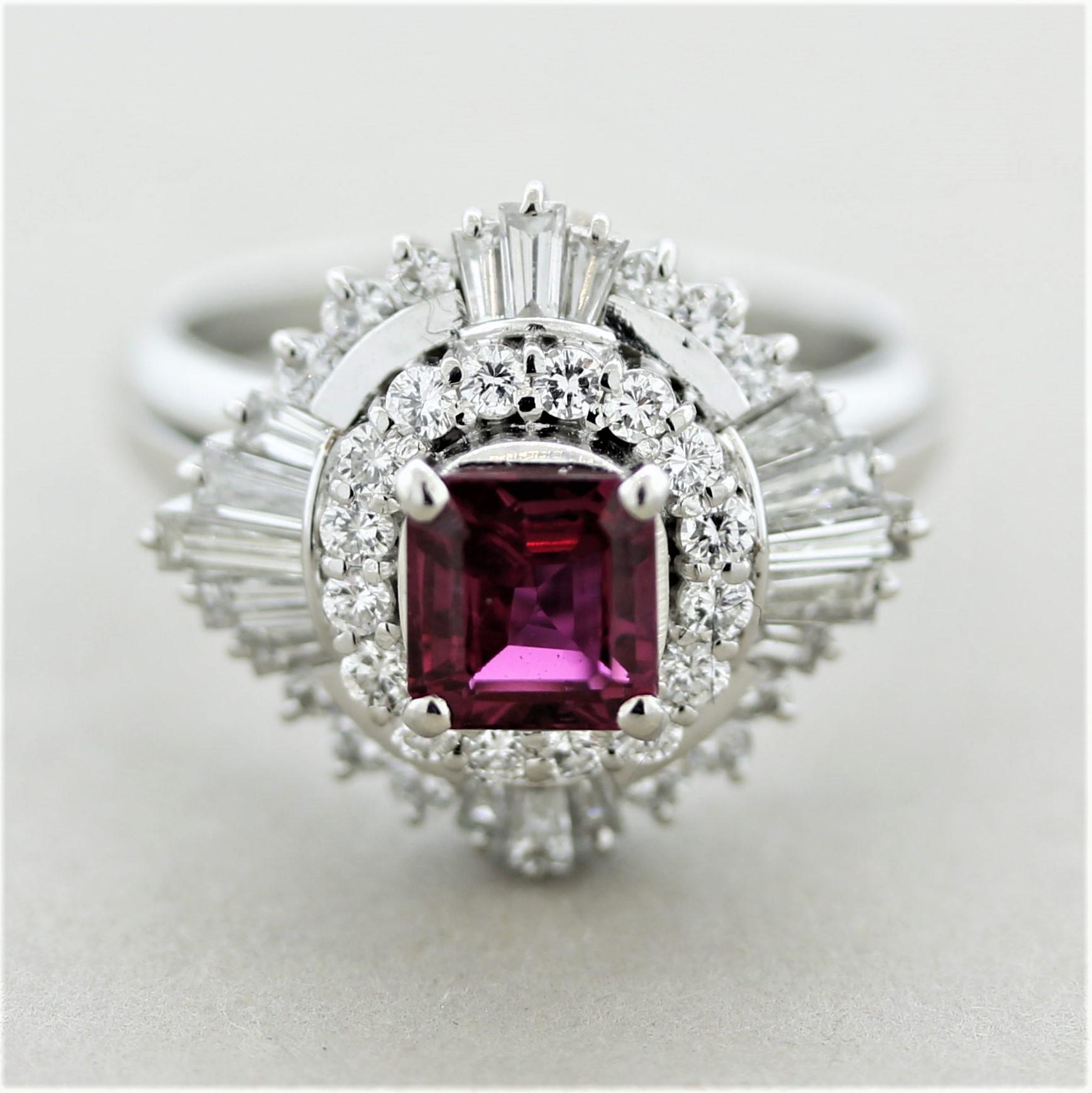 A sweet and stylish ring featuring a fine 1.02 carat square-shaped ruby. It has a bright and intense slightly purplish red color that is extremely fine. It is accented by 1 carat of round brilliant and baguette-cut diamonds set in a stylish design