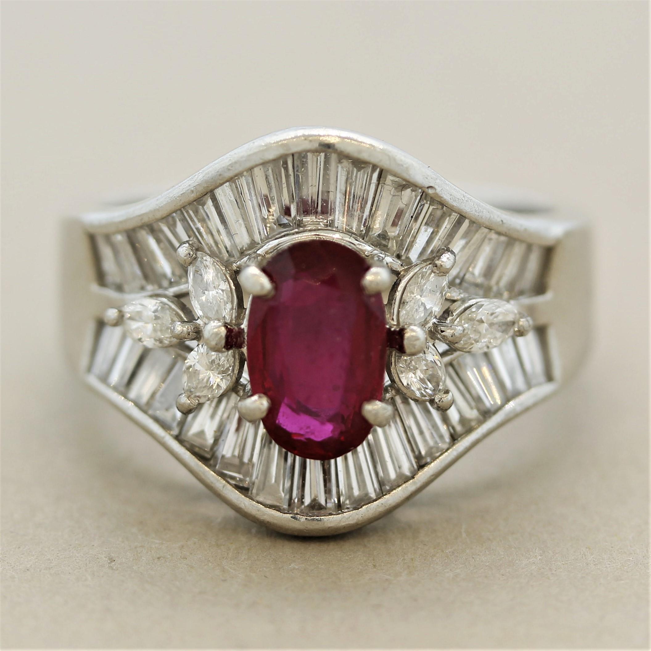A fine ruby weighing 1.22 carats with a rich vivid red color takes center stage. It is complemented by 1.50 carats of diamonds, 6 marquise-shaped set on the ruby’s sides and baguette-cuts channel set above and below. Hand-fabricated in platinum, a
