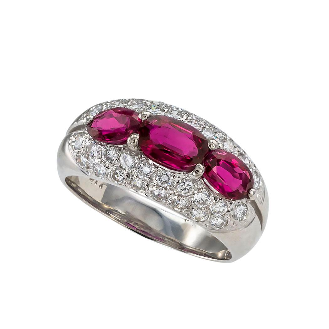 Ruby diamond and platinum three stone ring circa 1990.  Clear and concise information you want to know is listed below.  Contact us right away if you have additional questions.  We are here to connect you with beautiful and affordable