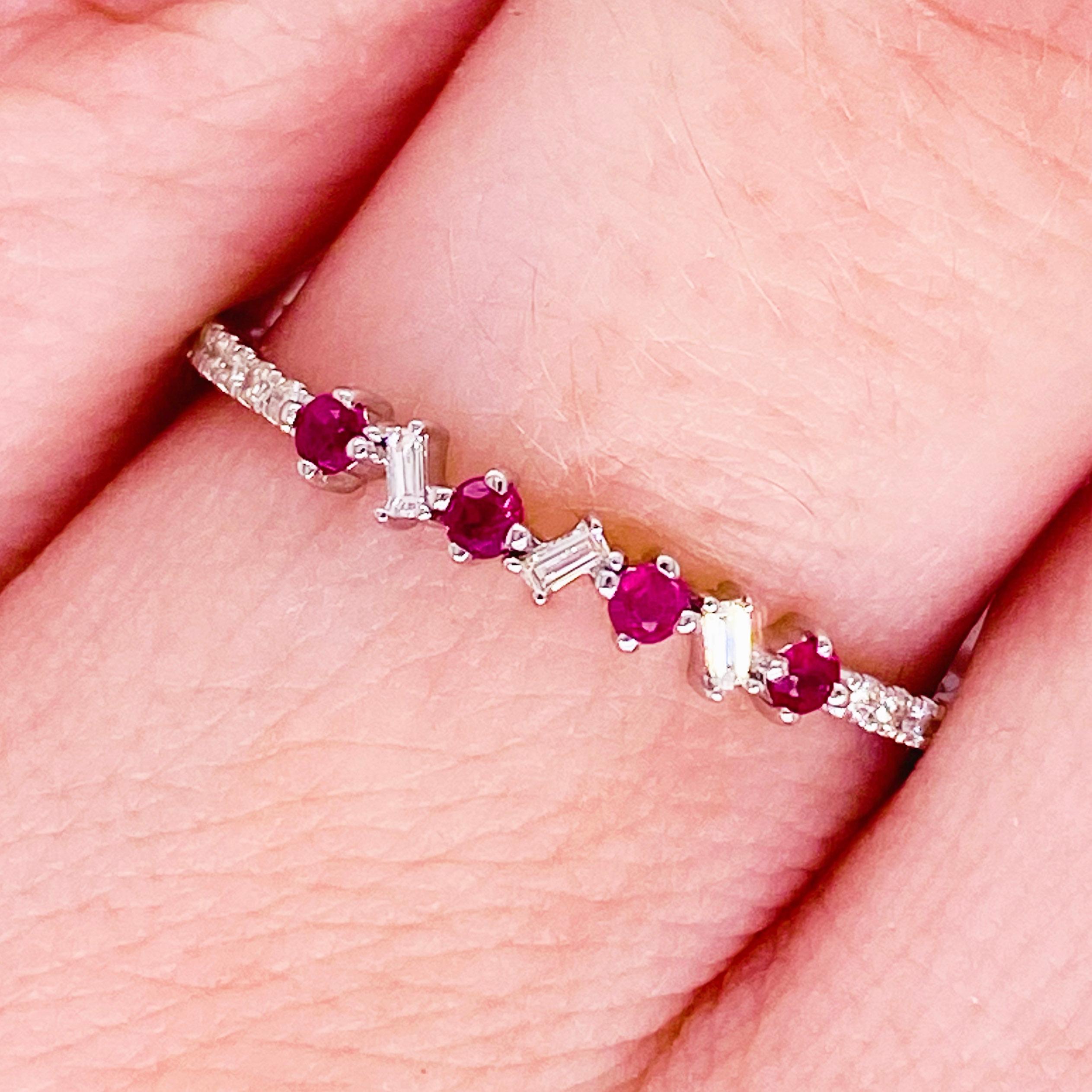 Vibrant rubies and bright white diamonds have never looked better! This ruby and diamond band has genuine, natural round ruby gemstones set next to bright baguette and round white diamonds. The stones are set in a 14 karat white gold band! It looks