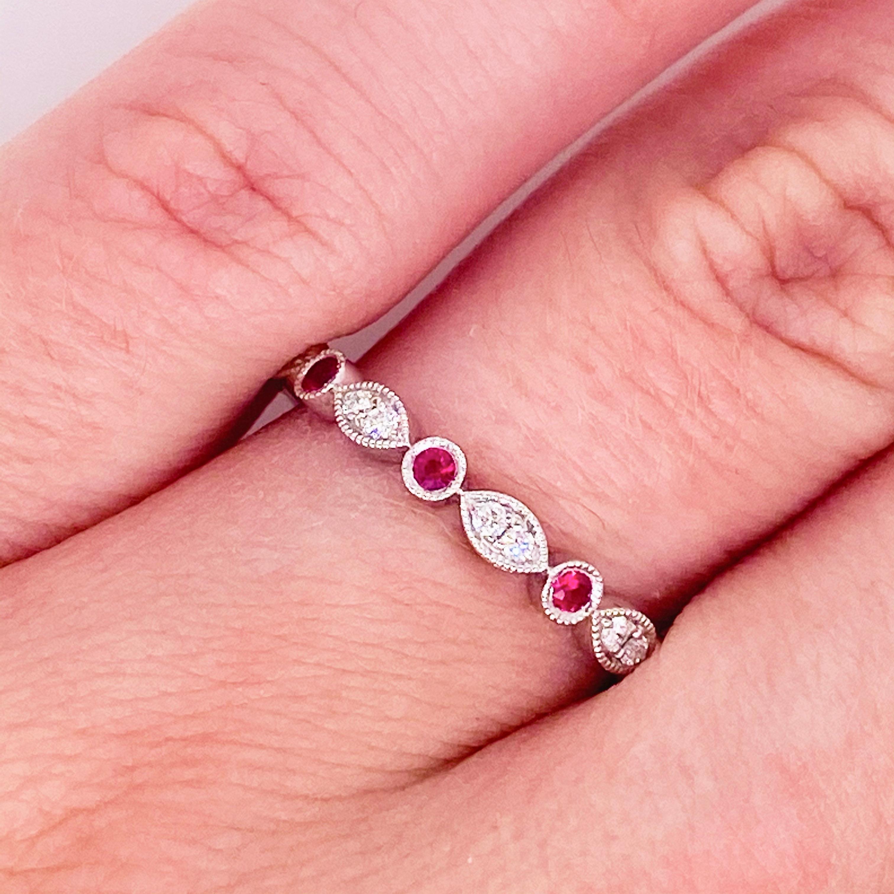 Would you like rubies to adorn your finger?  Would you like rubies to add to other stackable bands? If so, this is the band for you!  The marquise shape alternating with the round rubies is very striking!  The hand detail of hand engraved milgrain