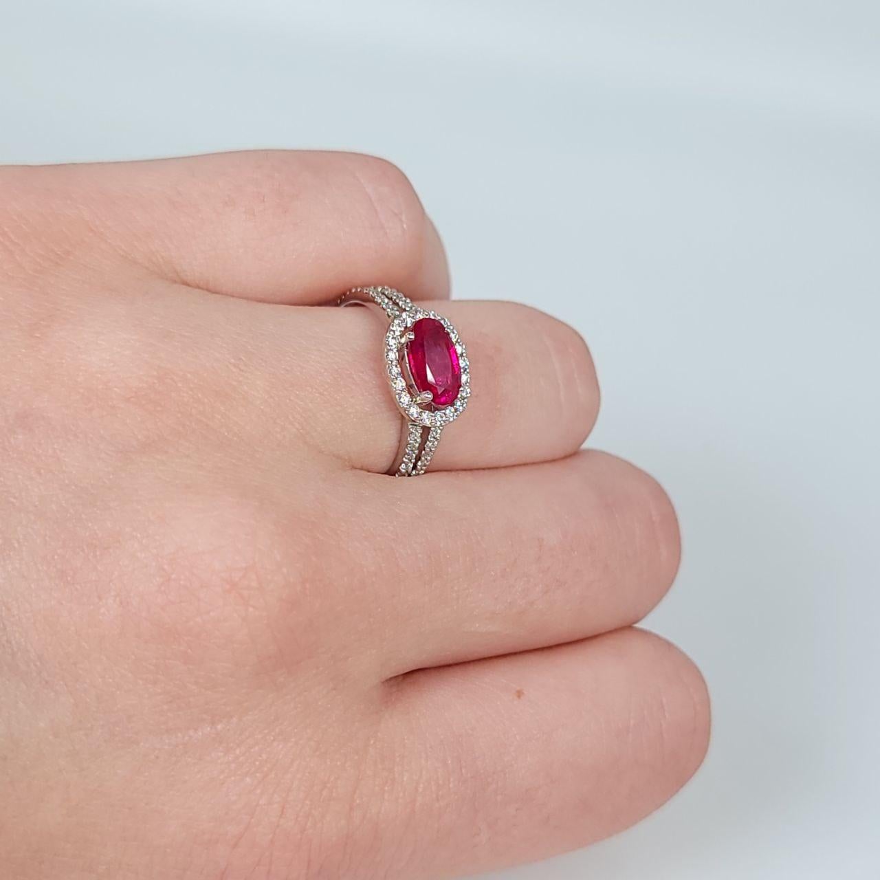 Stunning ruby & diamond cocktail ring made with 100% natural ruby and diamonds.

GRAM WEIGHT: 3.34gr
METAL: 18KT white gold

NATURAL DIAMOND(S)
Cut: Round Brilliant
Color: G 
Clarity: SI (average)
Carat: 0.45ct

NATURAL RUBY (NATURAL UNTREATED)
Cut:
