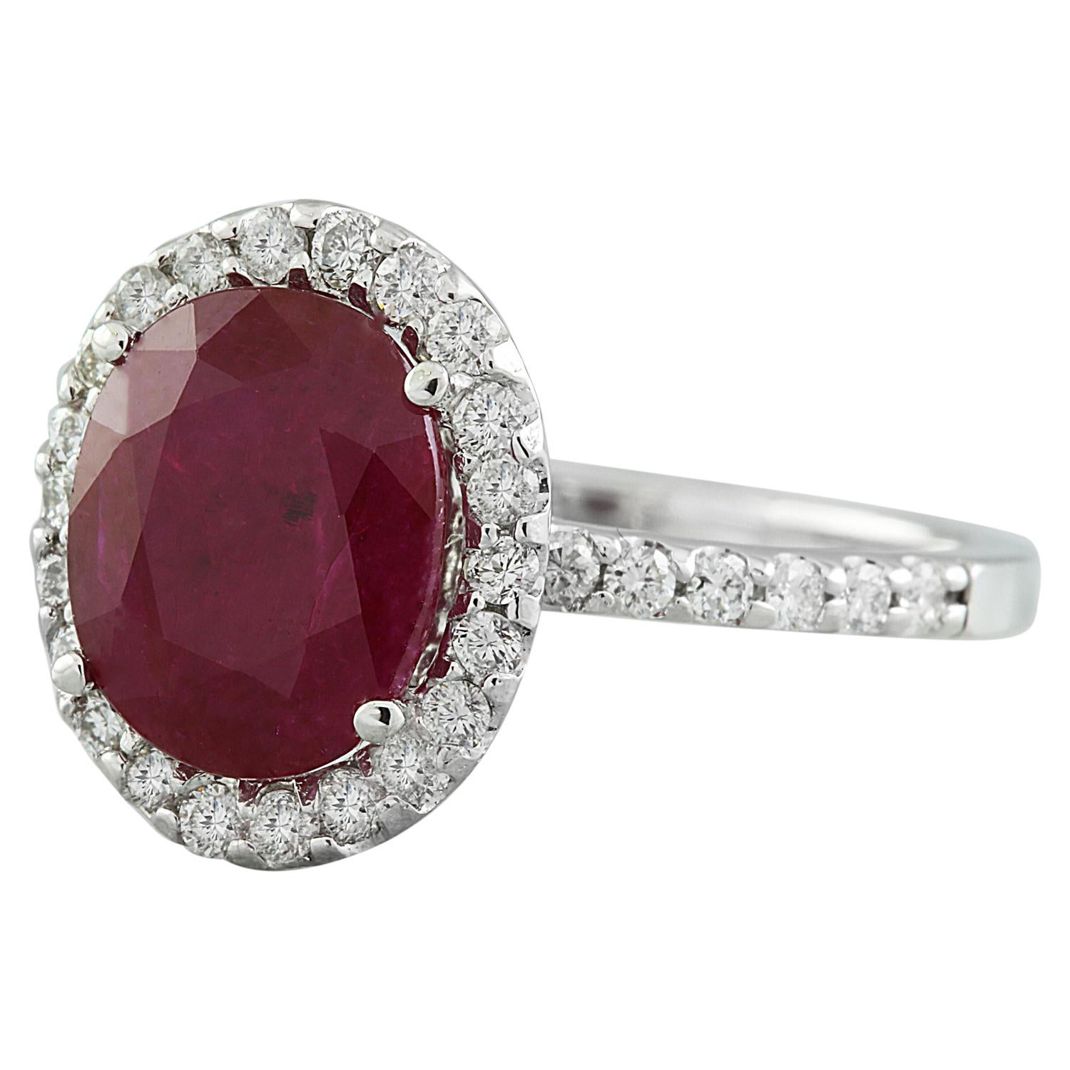 3.44 Carat Natural Ruby 14 Karat Solid White Gold Diamond Ring
Stamped: 14K 
Total Ring Weight: 3.5 Grams 
Ruby Weight: 2.80 Carat (10.00x8.00 Millimeters) 
Diamond Weight: 0.64 carat (F-G Color, VS2-SI1 Clarity )
Quantity: 34
Face Measures: