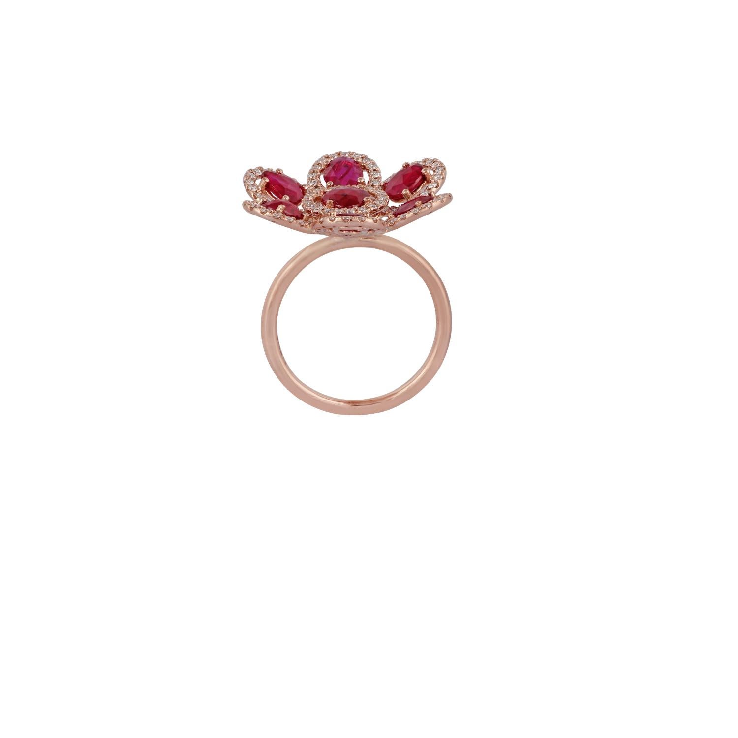 It's an Elegant Ruby & Diamond Ring features 7 rose cut rubies weight 2.38 carats with 123 round brilliant cut diamonds weight 0.64 carats, the entire ring is studded in 18K rose gold weight 4.95 grams, this is a gorgeous cocktail-style ring.