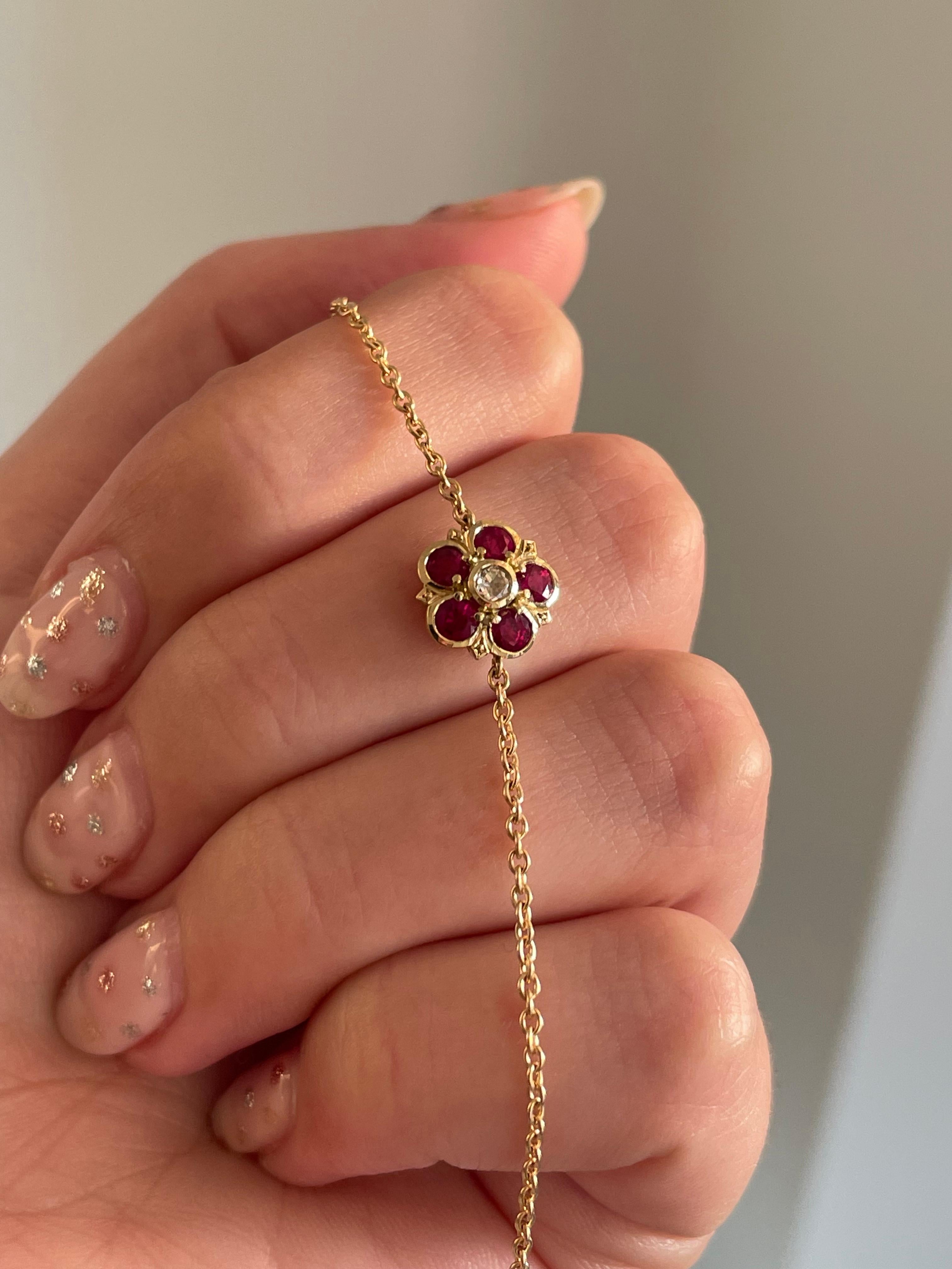 The ruby & diamond Rose bracelet features round brilliant-cut rubies surrounding a rose cut diamond. In true Aril Jewels style, the back of the bracelet is just as gorgeous, featuring a tiny rose cut diamond - an extra detail just for the wearer.  
