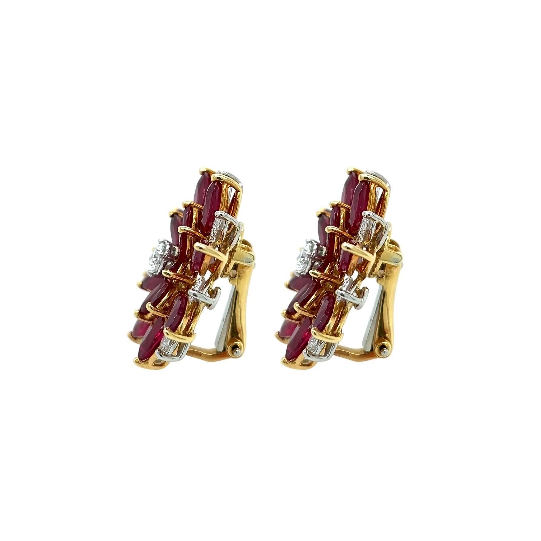 A pair of yellow gold, platinum, ruby and diamond earclips.  Each earclip designed as a starburst with approximately eight platinum set marquise cut diamonds, 16 gold set marquise cut rubies and one platinum set round brilliant cut diamond.  Total