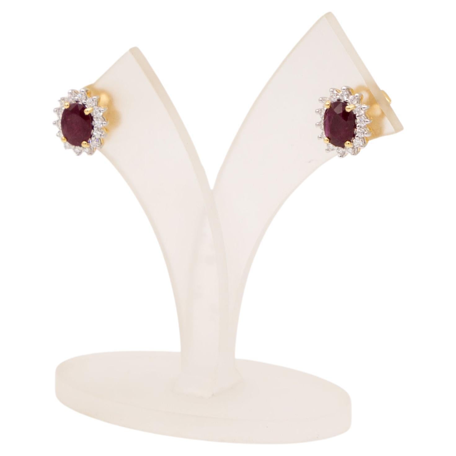 Orecchino con diamante e rubino 18 K.