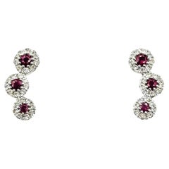 Boucles d'oreilles rubis et diamants en or blanc 14k