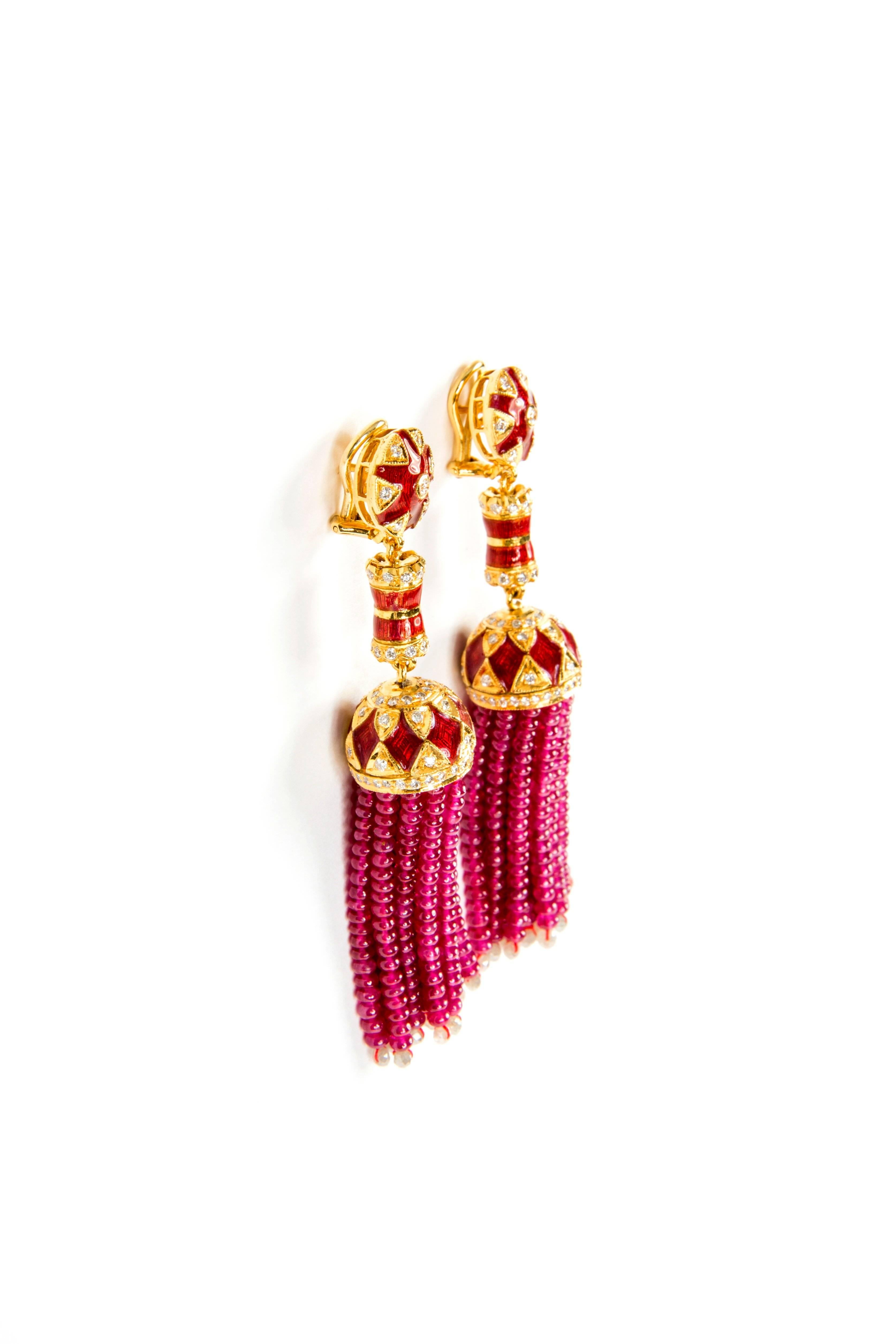 Ruby and Diamond Tassel Earrings
154 diamonds ca 1 ct
30 strings with ruby beads ca 80ct
18 karat yellow gold
come with clips and studs. either can be removed free of charge