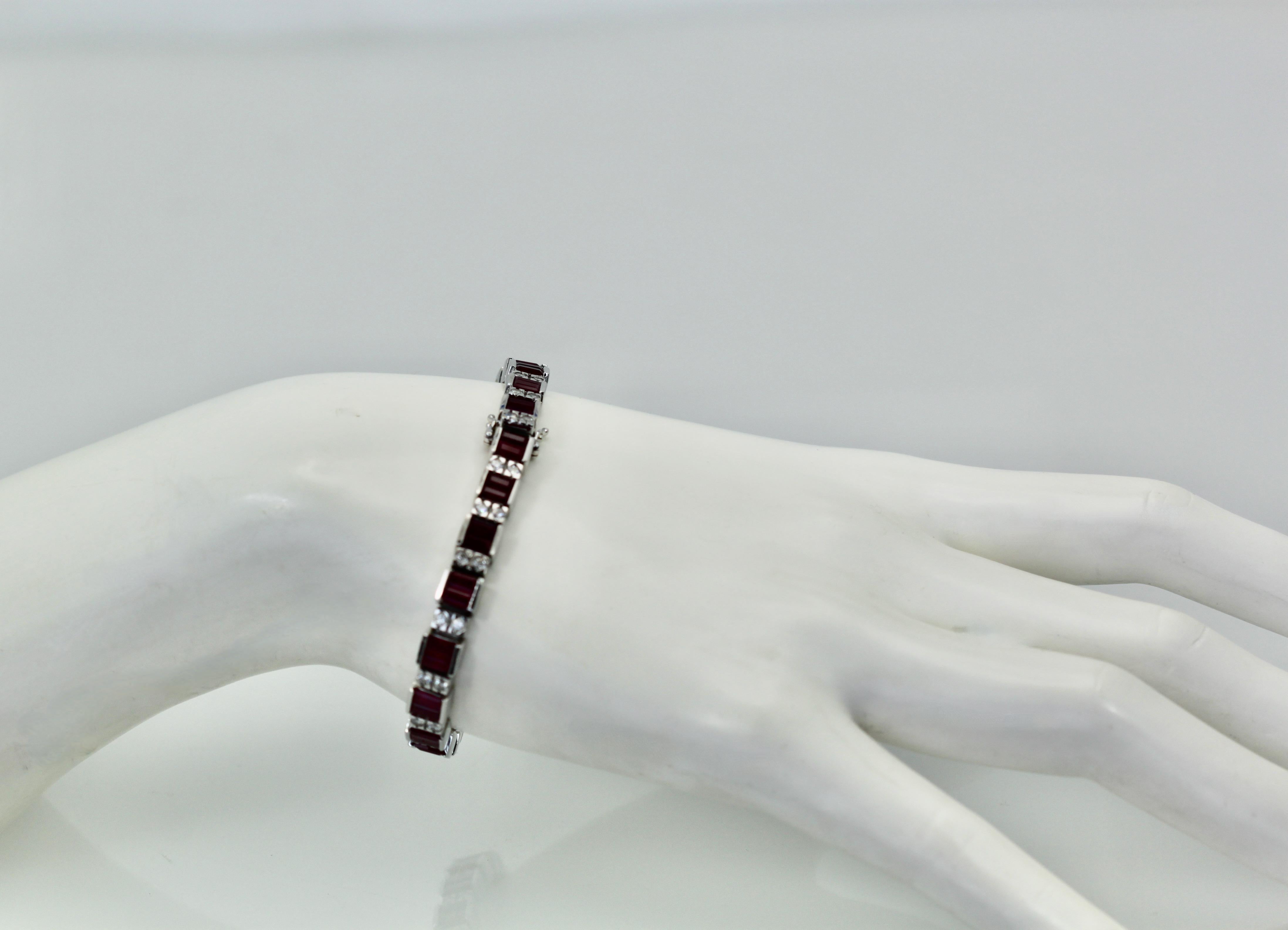 This lovely Ruby Diamond tennis or line bracelet is made in 18K white gold and it alternates  between Rubies and Diamonds.  The bracelet size is 7 it has Natural Baguette Rubies and full cut Diamonds.  These Rubies are a beautiful color of red and
