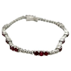 Conjunto de pulsera de tenis de rubíes y diamantes en oro blanco de 18 ct