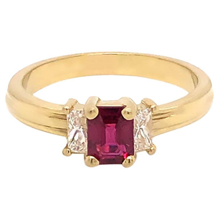 Ruby and Diamond Three-Stone Ring in 18 Karat Yellow Gold