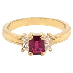 Ruby and Diamond Three-Stone Ring in 18 Karat Yellow Gold