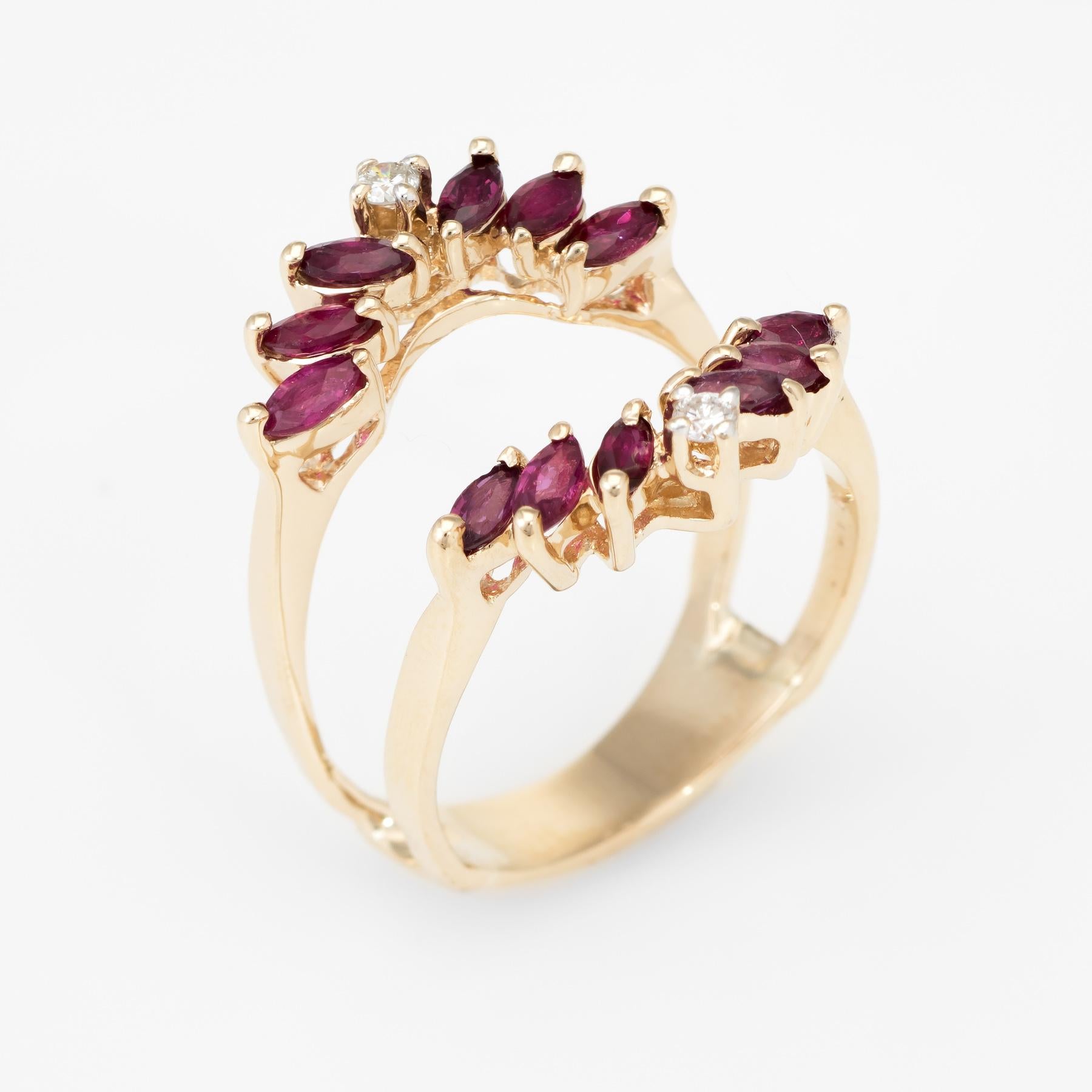 Finely detailed vintage wedding ring guard, crafted in 14 karat yellow gold. 

Faceted marquise cut rubies are estimated at 0.10 carats each (1.20 carats total estimated weight), accented with an estimated 0.06 carats (estimated at H-I color and VS2