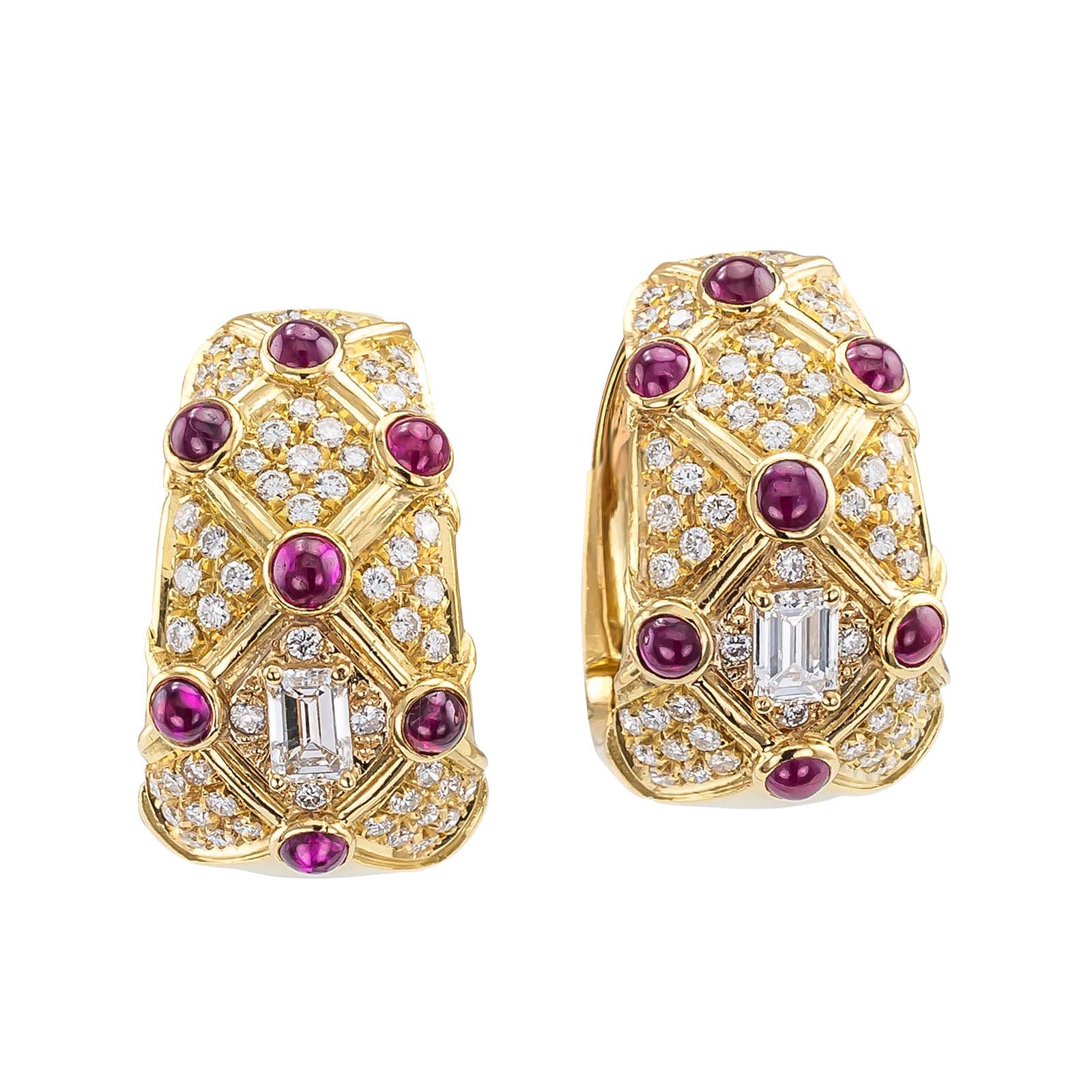 DETAILS:
Estate ruby diamond and gold clip-on hoop earrings circa 1970.

DIAMONDS: two emerald-cut and one hundred twelve round brilliant-cut diamonds together weighing approximately 2.75 carats, approximately F – G color and VS clarity.

GEMSTONES: