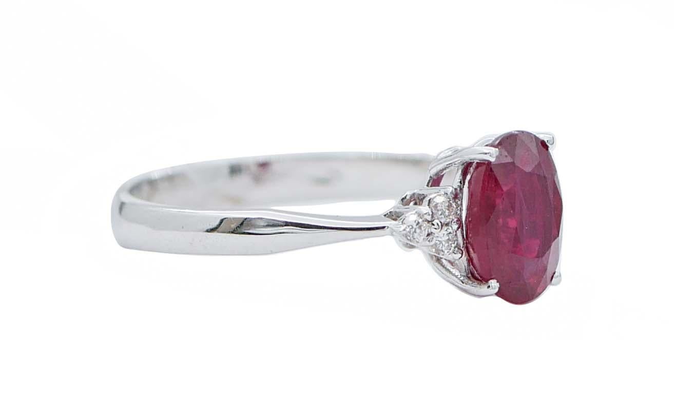 SHIPPING POLICY: 
Shipping costs will be totally covered by the seller (customs duties included).

Elegant modern ring in 18 kt white gold structure mounted with a central ruby and, for each side, three diamonds.
Diamonds 0.10 ct
Ruby 1.82 ct - 8 mm