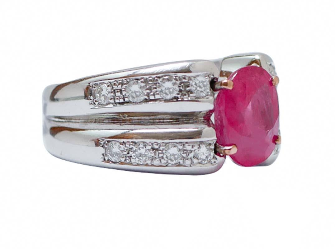 Fantastic ring in 18 kt white gold structure mounted with a central ruby  and,laterally, diamonds.
This ring was totally handmade by Italian master goldsmiths and it is in perfect conditions.
Diamonds 0.40 ct
Ruby 3.85 ct - 10 mm x 8 mm
Total Weight