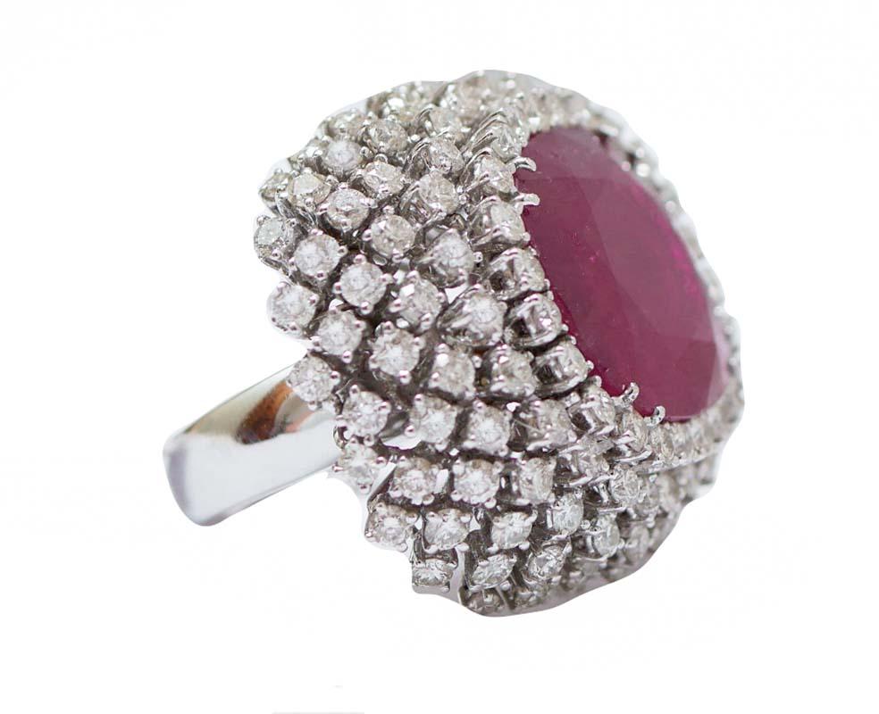 Maxi ring in 18 kt white gold structure mounted with a cetral ruby surrounded by diamonds.
This ring was totally handmade by Italian master goldsmiths and it is in perfect conditions.
Diamonds 6.82 ct
Ruby 27.80 ct
Total Weight 30.90 gr
RF 