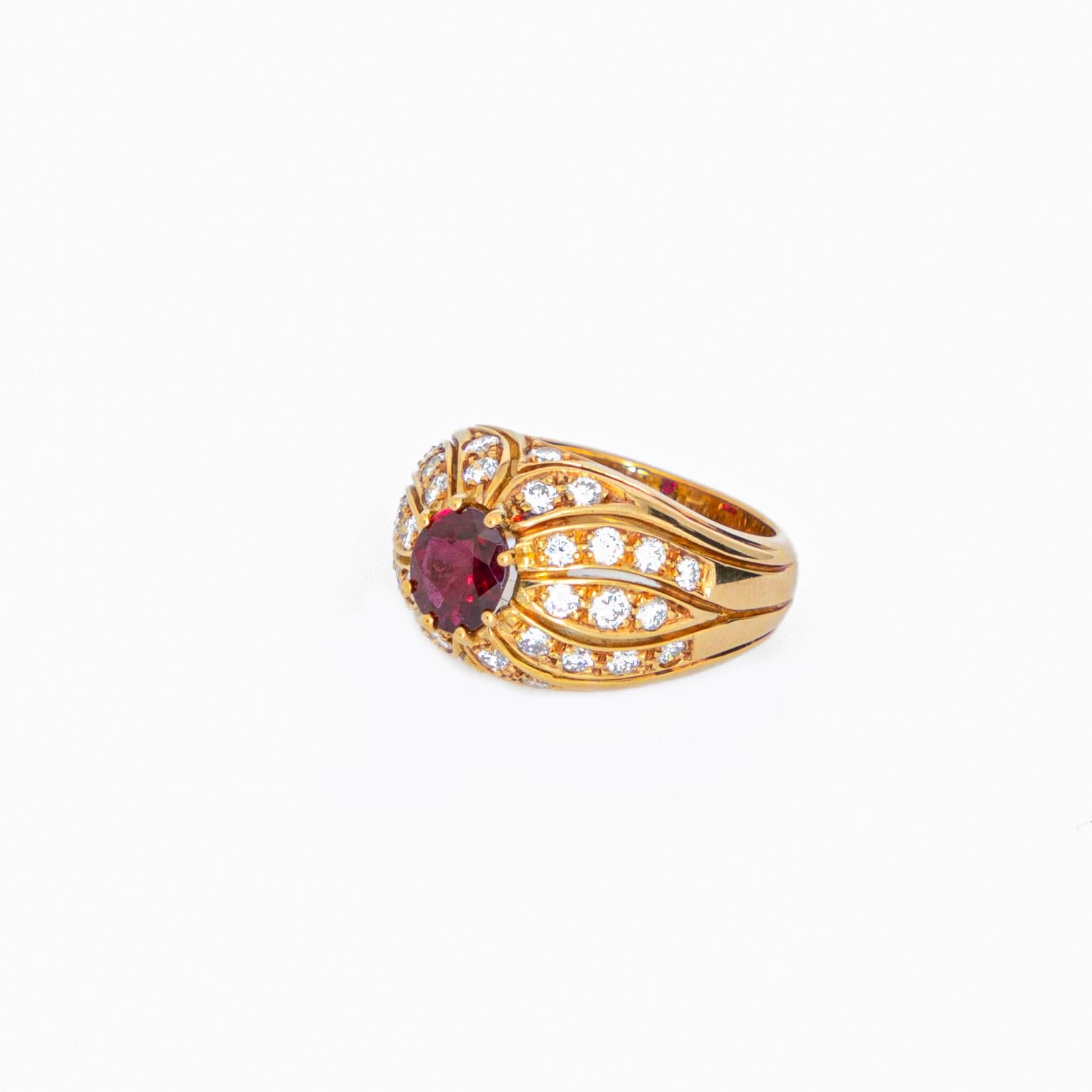 This extraordinary diamond cluster ring features princess diamonds and a round ruby. All artfully set and crafted in 18k yellow gold to create this stunning piece of jewelry. This artwork is for a diamond woman.

This design is inspired in the 1970
