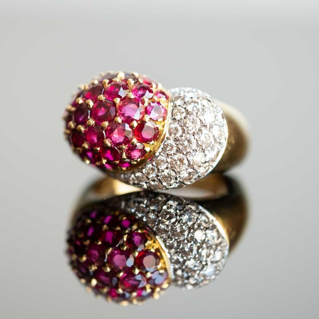 Elegant 1950s cocktail ring with contrarié diamonds and natural rubies of good quality set in 18ct gold.

Highlights
- 1950s period
- Round cut diamonds VVS for 1ct total c.a.
- Round cut natural rubies of good intense colour 1ct total c.a.
- Set in