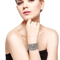 Pulsera de rubíes y diamantes con diseño de pavo real en oro de 18 quilates y plata