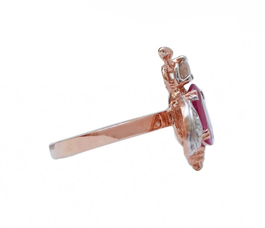Particular fly shape ring in 9 karat rose gold and silver structure mounted with a diamond as head, a ruby as body and wings studded with diamonds.
This ring was totally handmade by Italian master goldsmiths and it is in perfect conditions.
Diamonds