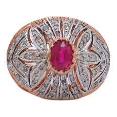 Ring aus Rubin, Diamanten, Roségold und Silber.