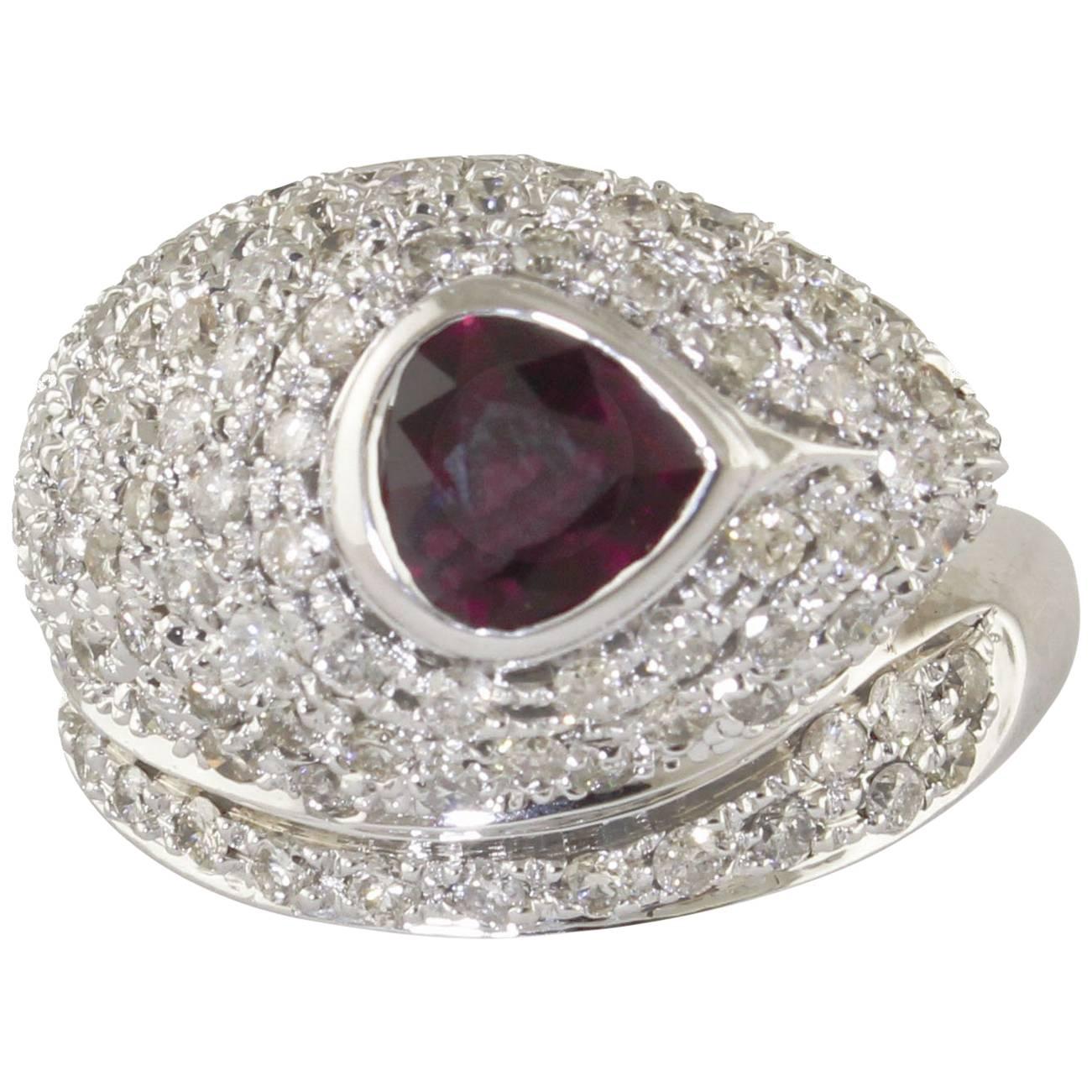 Bague serpent en or blanc avec rubis et diamants