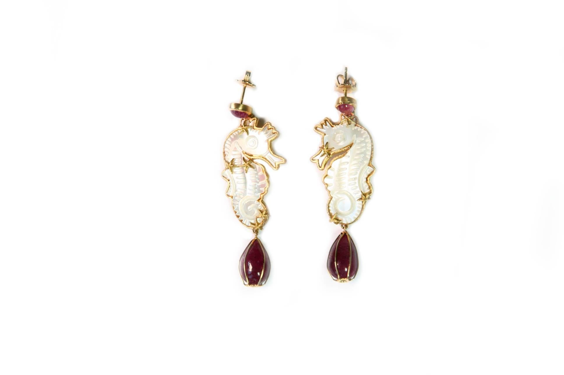 Earrings with carved  mother of pearls, ruby drop, pink  cabochon tourmaline, very nice decoration with gold with little sea stars back and front. 
18kt Gold total length 6cm, weight 8,5 gr each.
All Giulia Colussi jewelry is new and has never been