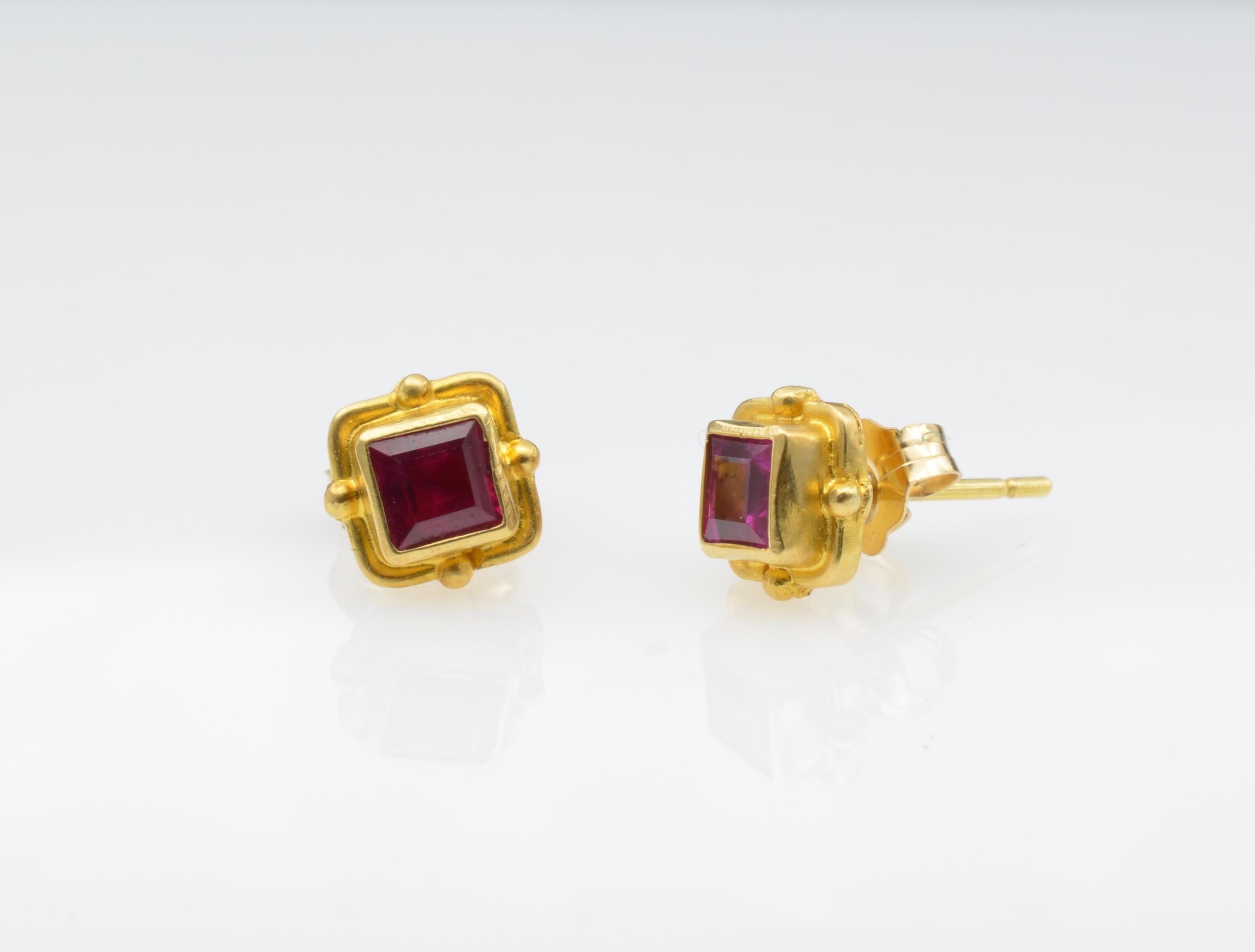 These delicate ruby beauties are vibrant deep red accented by 18k yellow gold for the perfect balance.  The delicate beaded bezel adds dimension. You can wear these every day as they are so pretty!