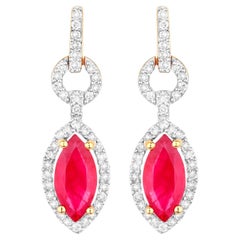 Orecchini di rubini con diamanti 1,2 carati in oro giallo 14K