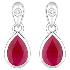 Orecchini di rubini con diamanti 1,64 carati in oro bianco 10K