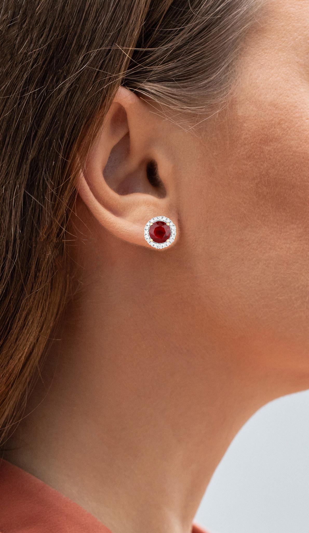 It comes with the Gemological Appraisal by GIA GG/AJP
All gemstones are natural
2 Rubies = 1.96 Carats
Treatment: Filling
40 Diamonds = 0.16 Carats
Metal: 14K Yellow Gold
Dimensions: 10 x 10 mm
