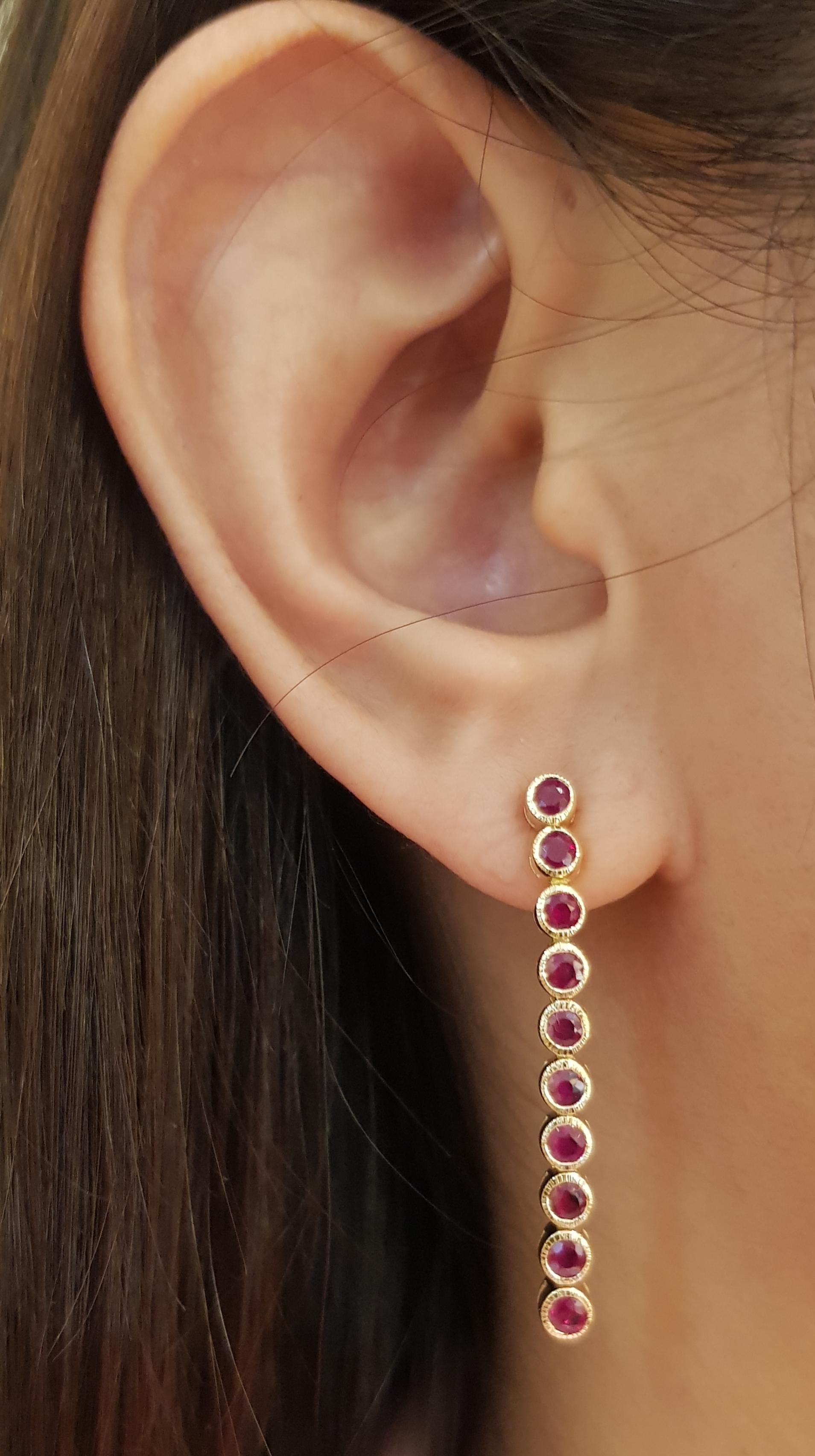 Contemporary Ruby Earrings Set in 18 Karat Gold Settings For Sale