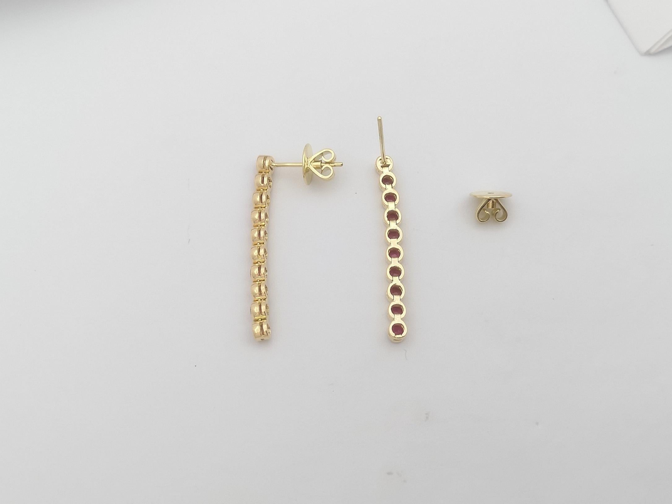 Women's Ruby Earrings Set in 18 Karat Gold Settings For Sale