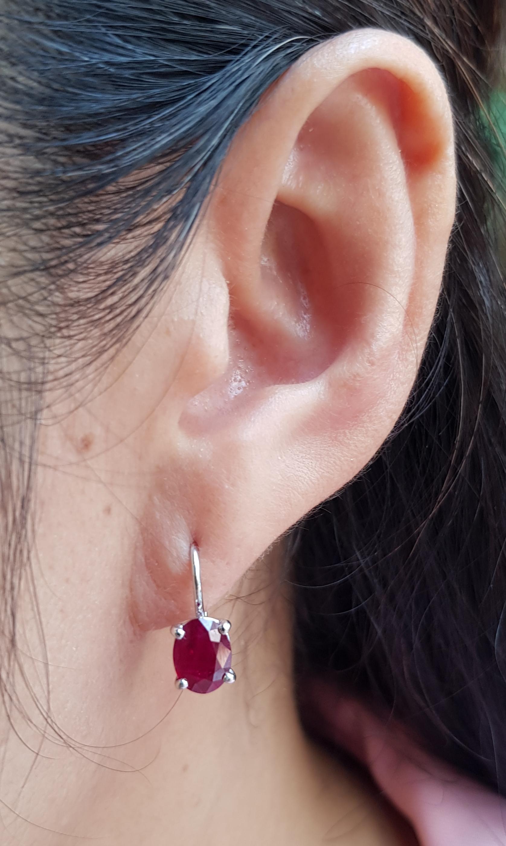 Ruby 3.02 carats Earrings set in 18 Karat White Gold Settings

Width:  0.6 cm 
Length: 1.7 cm
Total Weight: 3.05 grams

