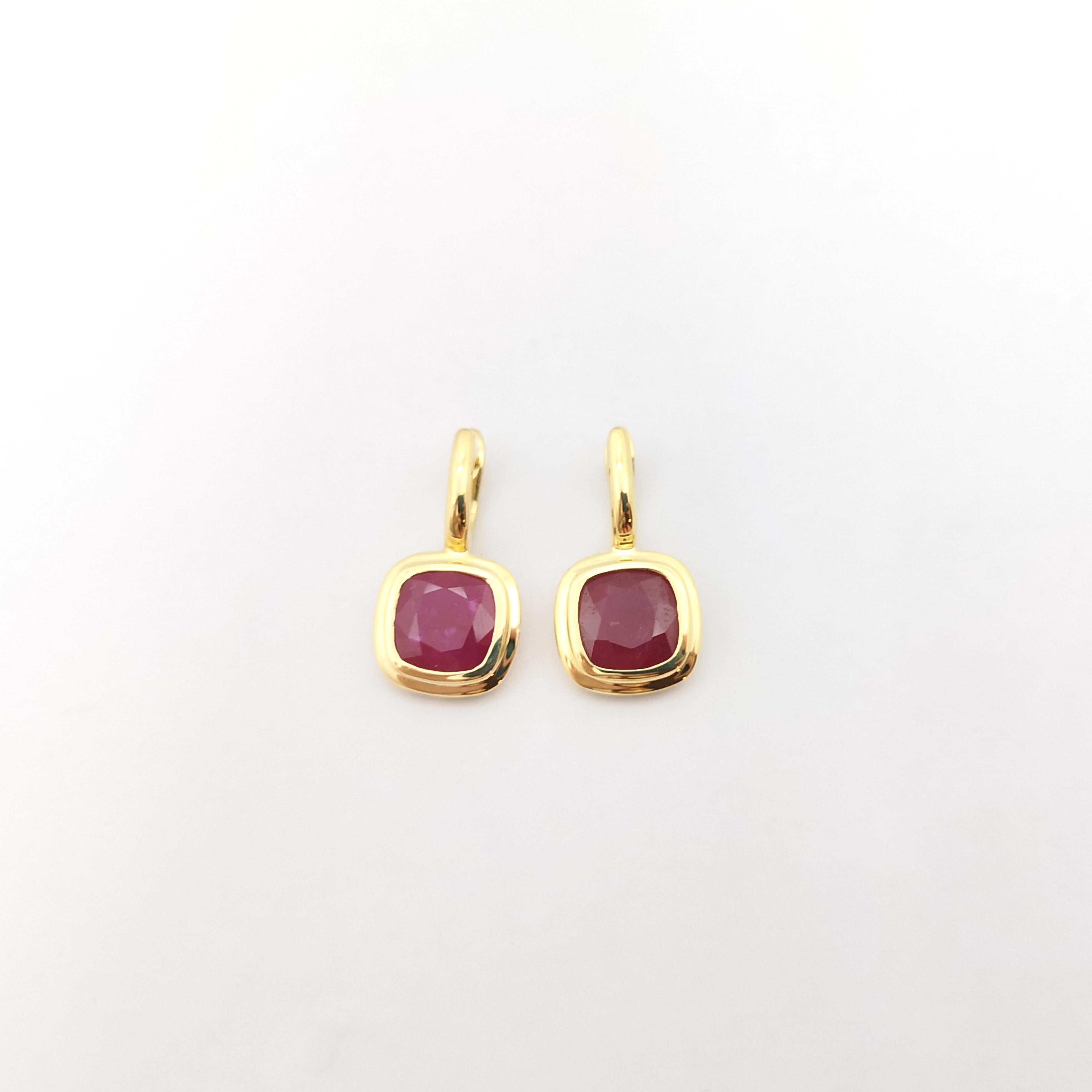 Cushion Cut Ruby Earrings set in 18K Gold Settings For Sale