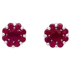 Boucles d'oreilles en or blanc 18 carats serties de rubis